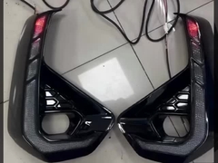 Lámpara de niebla de piezas de automóvil RGB Luz de día para Toyota Revo